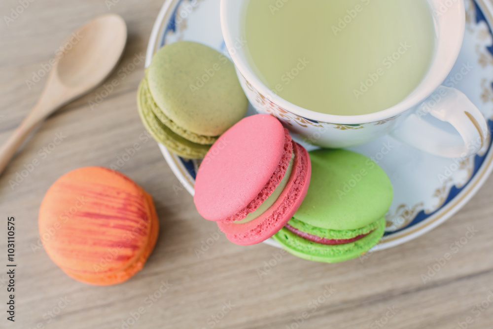 Cup of tea with colorful macaroons Cup of tea with colorful macaroons