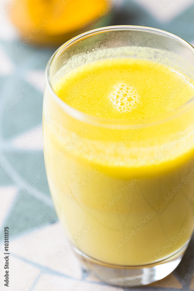 Turmeric with Coconut Milk Drinks and Ghee Good for Beauty and Health, Gives a lot of Energy, Close-up Turmeric with Coconut Milk Drinks and Ghee Good for Beauty and Health, Gives a lot of Energy, Close-up