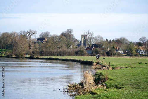Ditton Meadows, a common alongside the River Cam. The Cambridgeshire village of Fen Ditton, the tower of the St Mary the Virgin Parish Church dominant, is in the background. photo