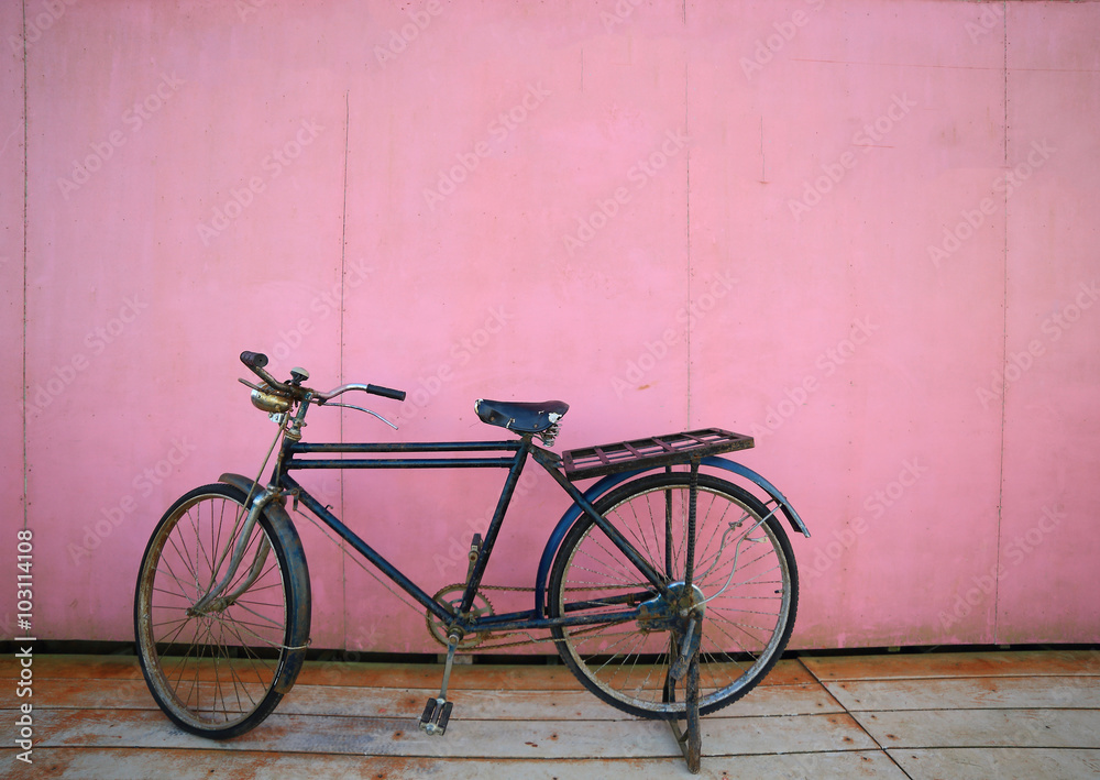 Bicycle/Photo of old bicycle park on wooden floor.
Bicycle/Photo of old bicycle park on wooden floor.