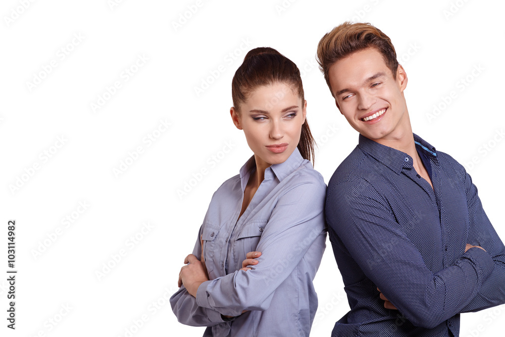 Successful business couple is standing in studio Successful business couple is standing in studio