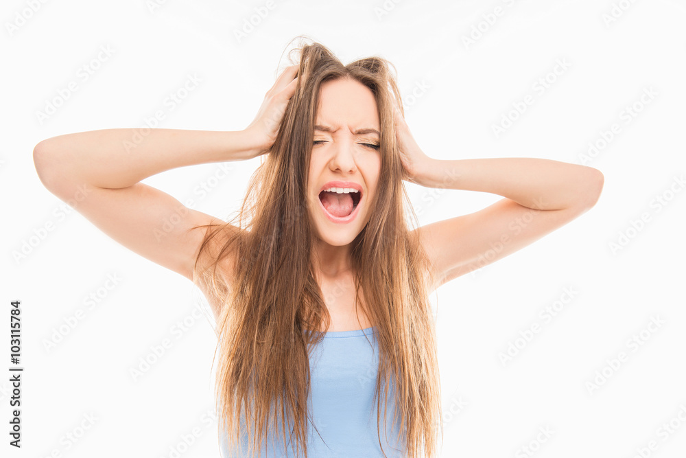 Portrait of very frustrated and angry woman with damaged hair Portrait of very frustrated and angry woman with damaged hair