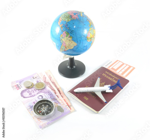  passport ,compass, airplane , orb and money on white background ,journey concept
