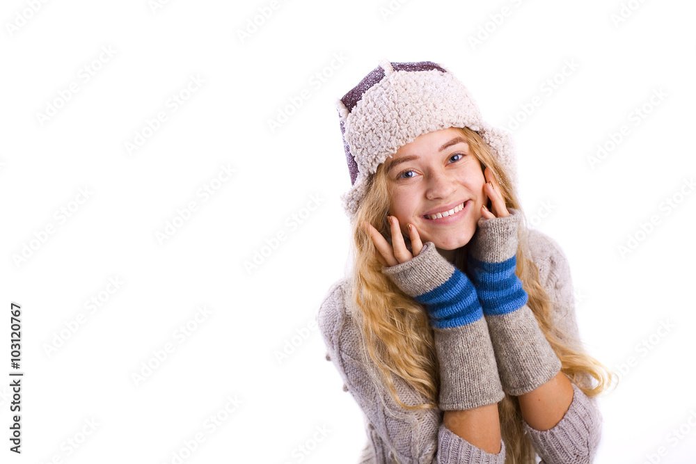 Horizontal portrait of a beautiful young blonde in a winter hat Horizontal portrait of a beautiful young blonde in a winter hat