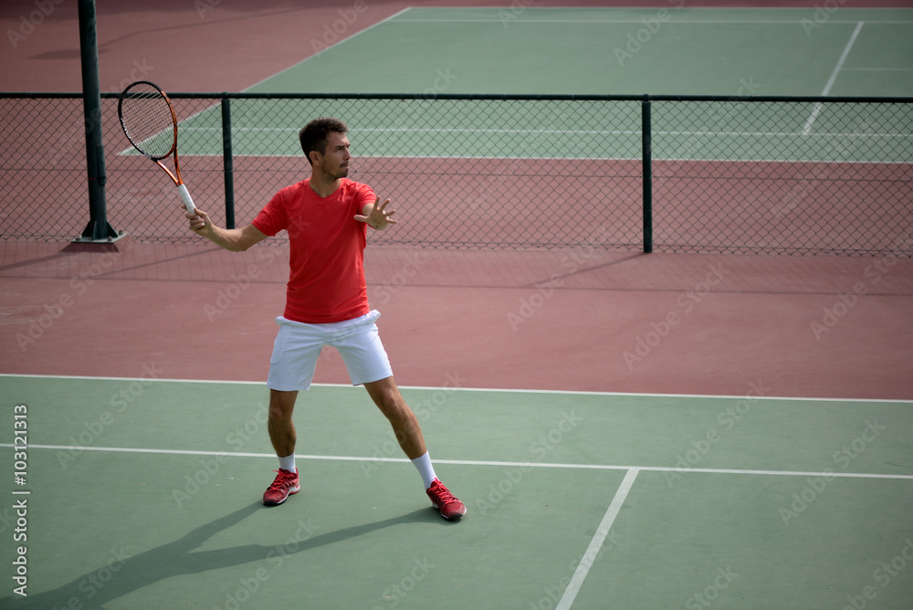 Male tennis player practice in tennis court