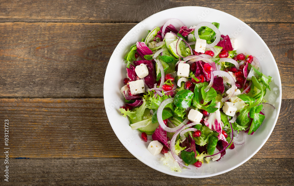 Fresh salad with feta, onion and pomegranate. Fresh salad with feta, onion and pomegranate.
