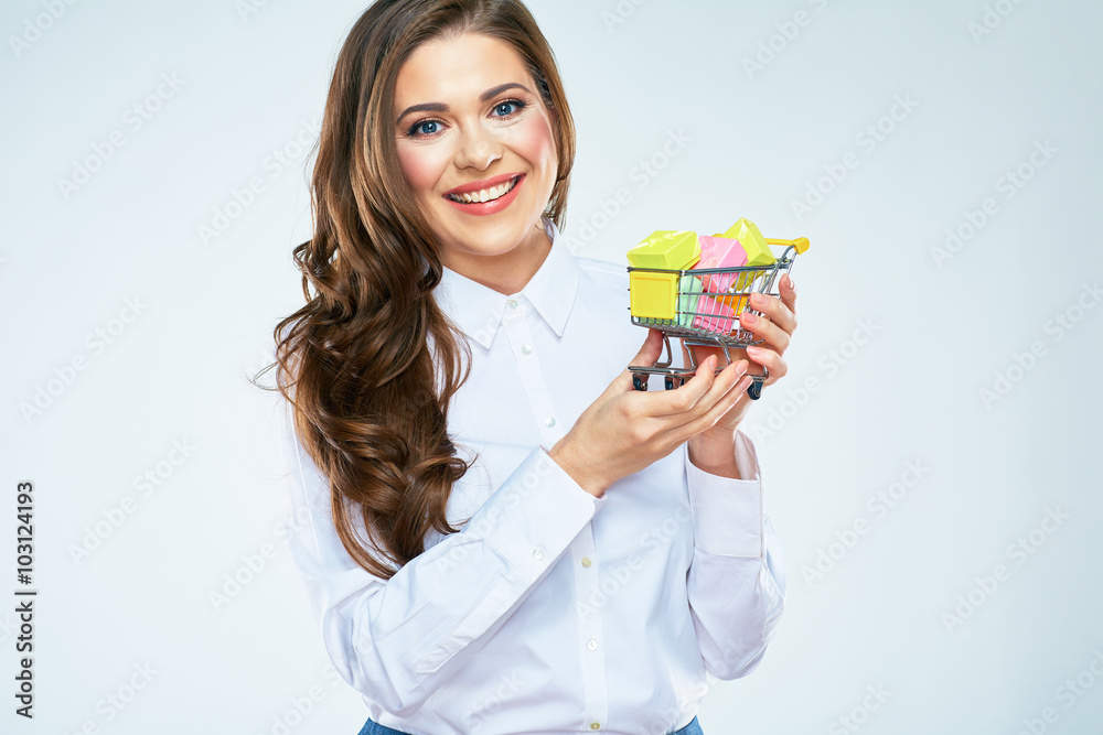 Happy woman hold market cart with presents. Happy woman hold market cart with presents.