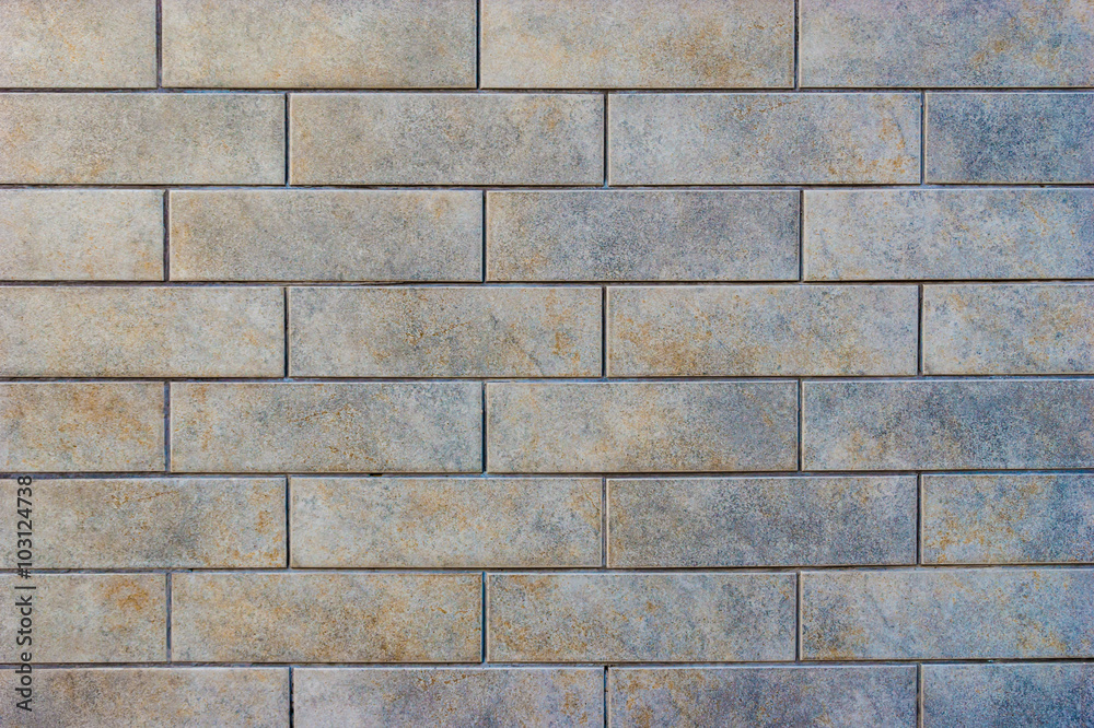 Obraz premium Grey brick tile wall background