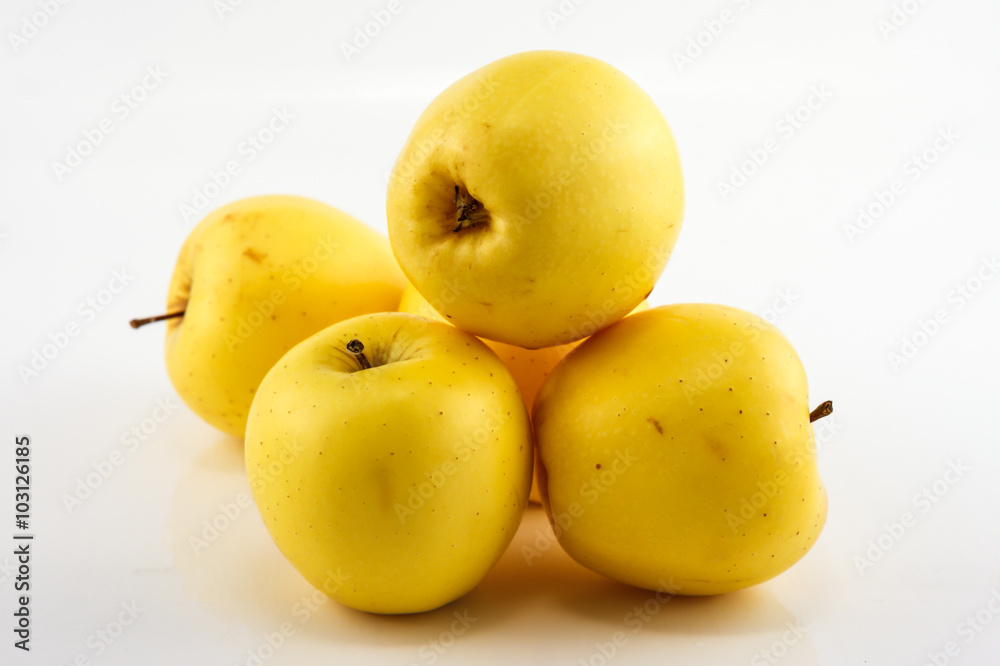 Yellow apples on the white background. Isolated Yellow apples on the white background. Isolated