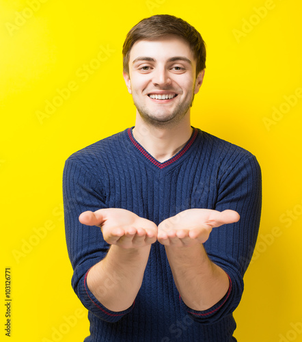 young man palm up