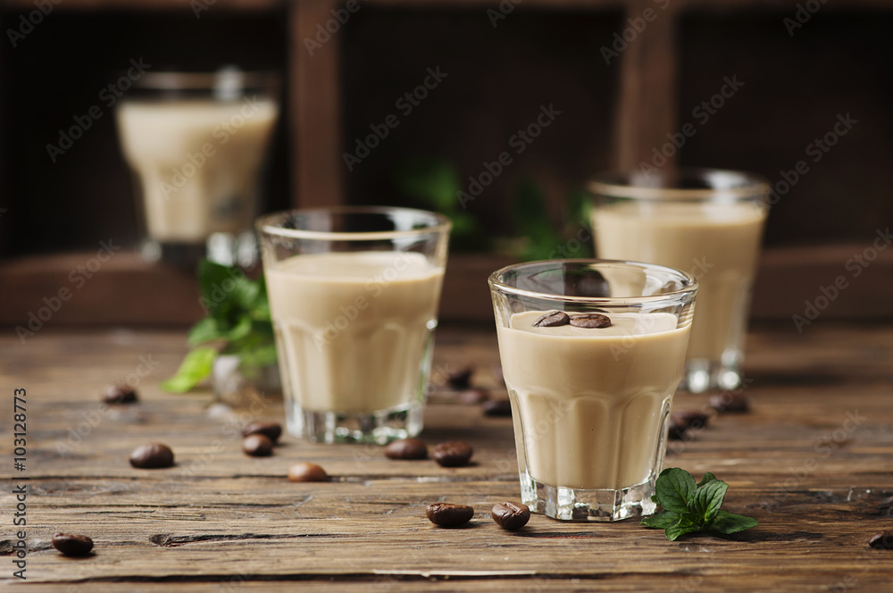 Cold cream with coffe and mint on the wooden table