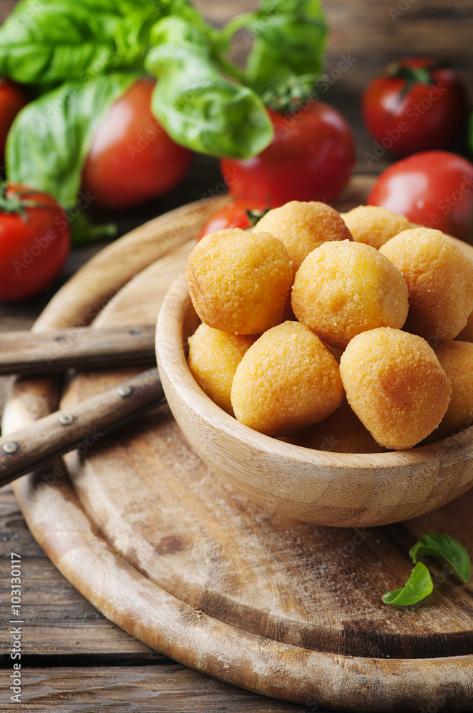Traditional italian fried balls of mozzarella Traditional italian fried balls of mozzarella