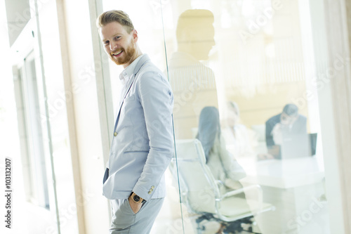 Modern young businessman in...