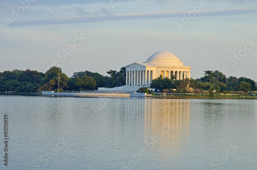 Jefferson Memorial and reflection on the Tidal Basin at sunset in Washington DC, United States of America