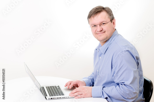 men working on laptop