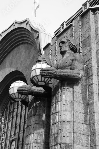 Statues adorn the main railway station, Helsinki.