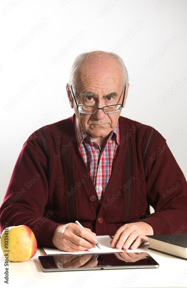 old man works with documents old man works with documents