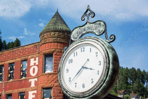 Old historic clock in the old west town of Deadwood, South Dakota photo