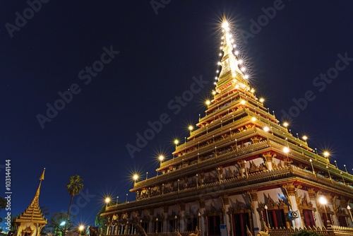 Night view of Golden pagoda in Public Temple (Wat Nong Wang), khonkaen, Thailand © KissShot