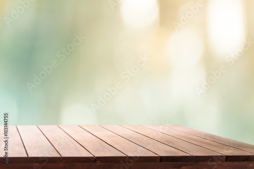 wood table in front of retro  bokeh lights  empty wood table for