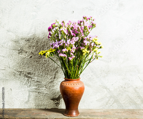 Fototapeta Naklejka Na Ścianę i Meble -  flower in vase on table