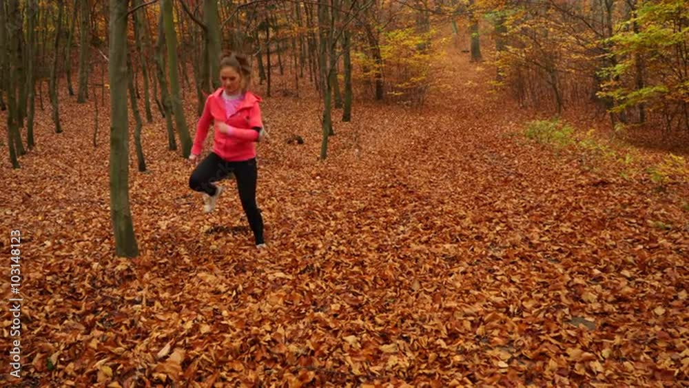 Woman with tracker app warming up 4K. Woman with tracker app warming up 4K.