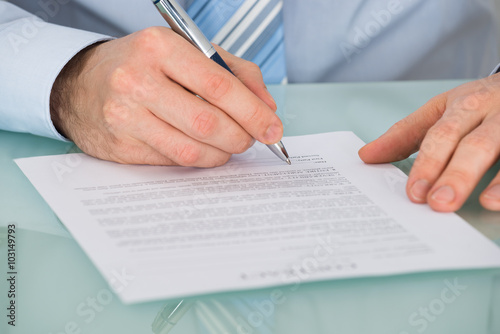 Businessman Signing Contract Form