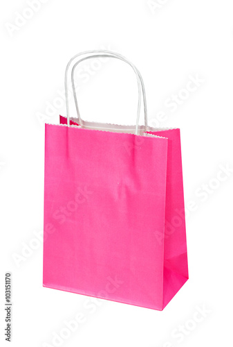 The bright pink paper package, bag for gifts or purchases isolated on the white