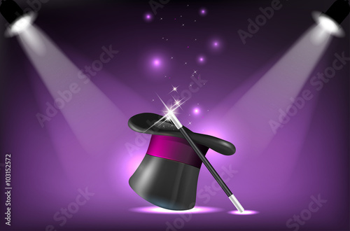 Magicians hat and wand on stage lighting reflectors