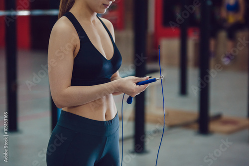 Girl with skipping rope photo