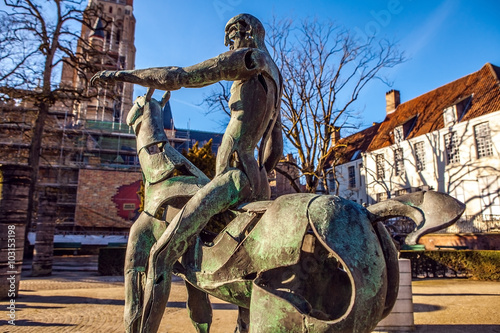 Fotografi Four horsemen of Apocalypse statue in Bruges, Belgium.