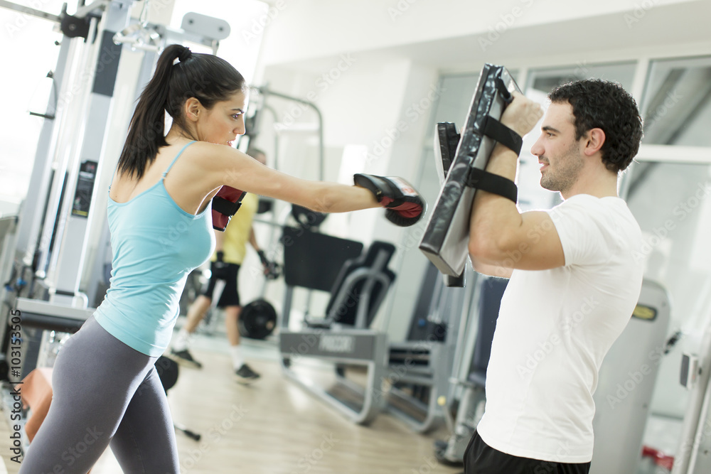 Young woman training in the gym Young woman training in the gym