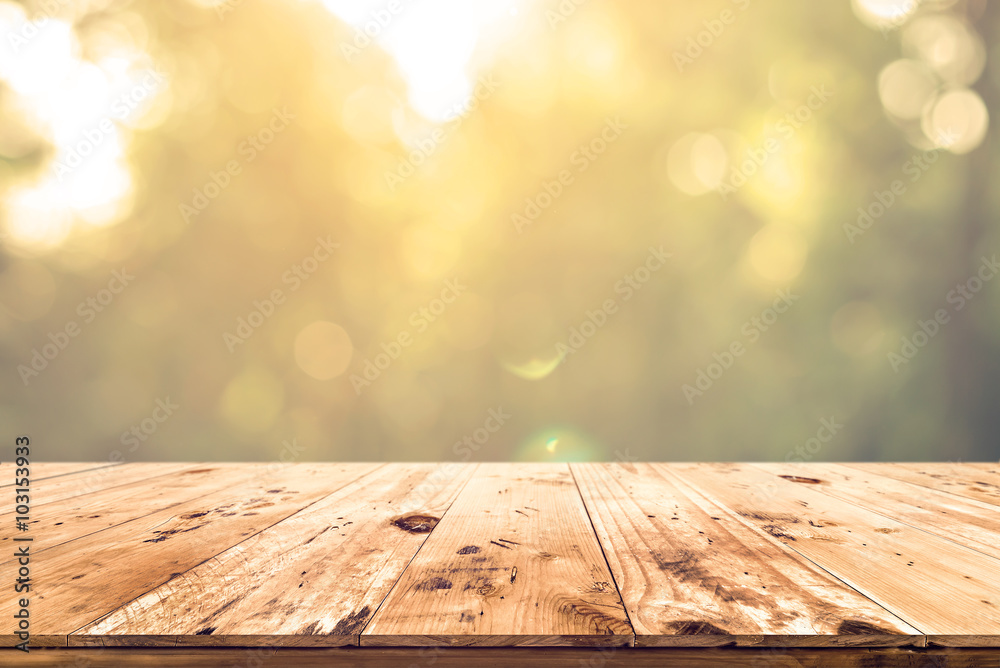 Top of wood table with blurred bokeh nature background - Empty ready for your product display or montage. - obrazy, fototapety, plakaty 