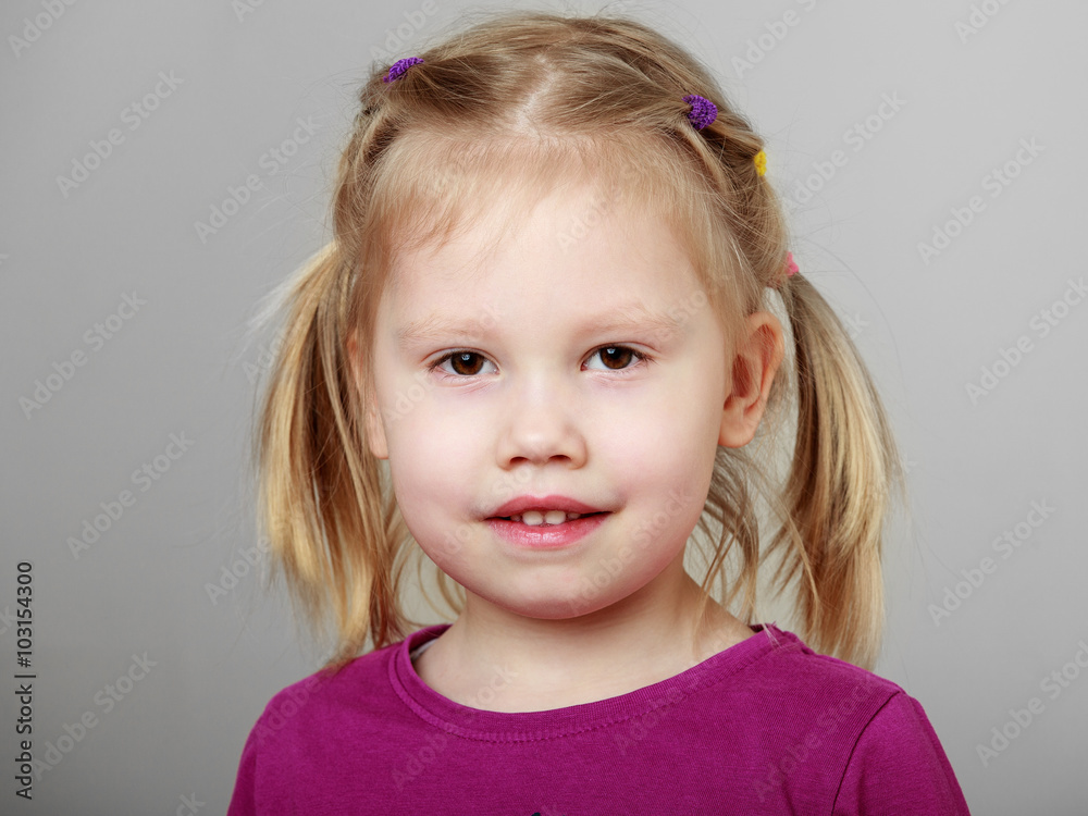 Close up portrait of a cute smiling blonde girl Close up portrait of a cute smiling blonde girl