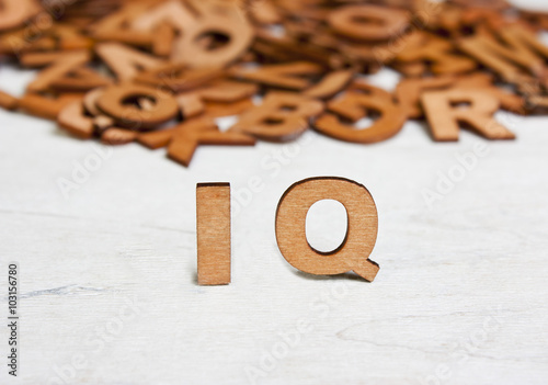 Word  IQ (Intelligence quotient ) made with wooden letters photo