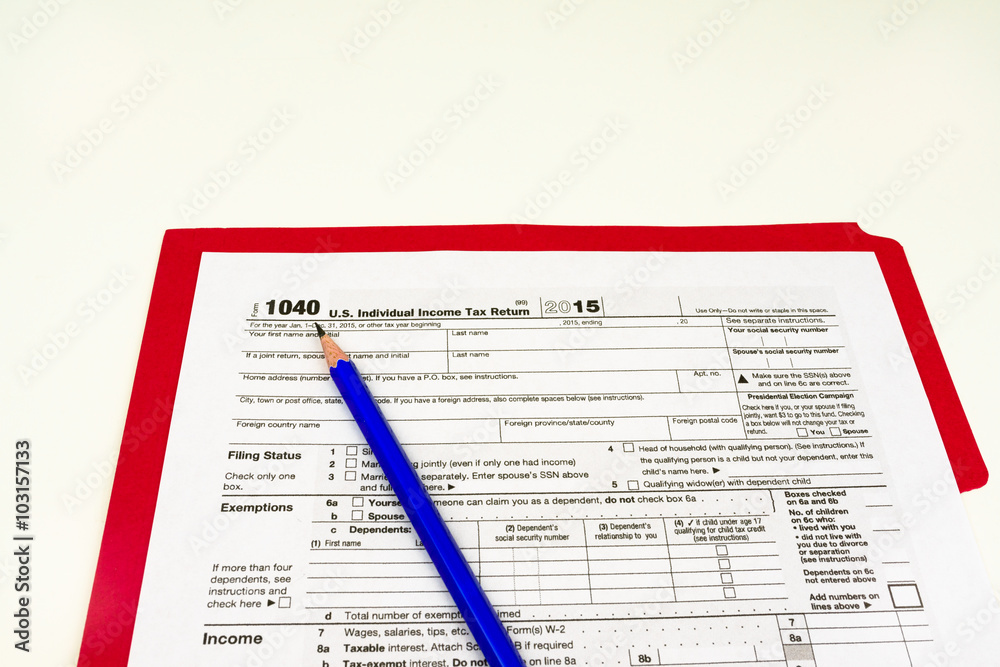 Fototapeta premium Tax Form 1040, Tax Form Details with Light Background