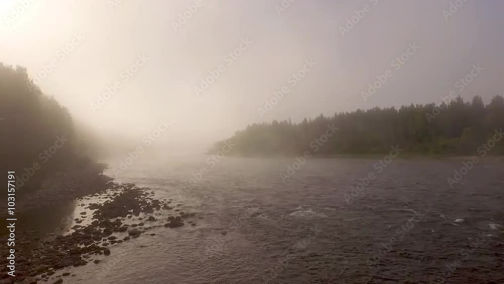 Morning flight over the misty river. Beautiful sunrise. Morning flight over the misty river. Beautiful sunrise.