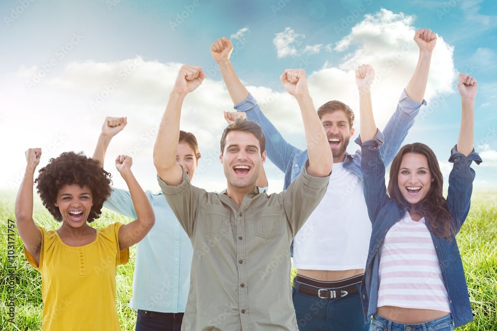 Composite image of young creative business people gesturing arm Composite image of young creative business people gesturing arm