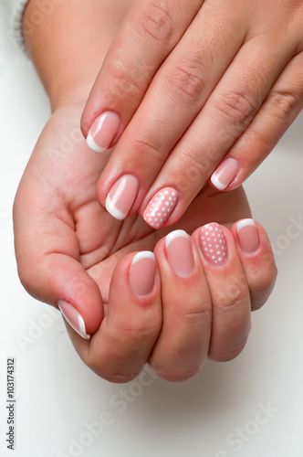 French manicure with pink peas