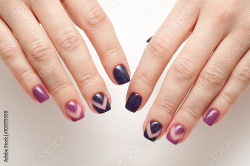 exclusive manicure on short nails in shades of purple