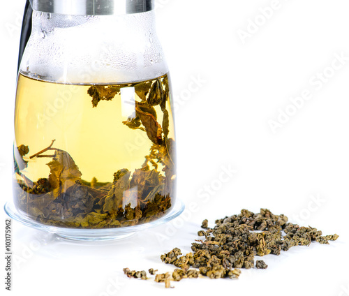 close-up of Chinese Ginseng Oolong Tea and brewed tea in a teapo photo