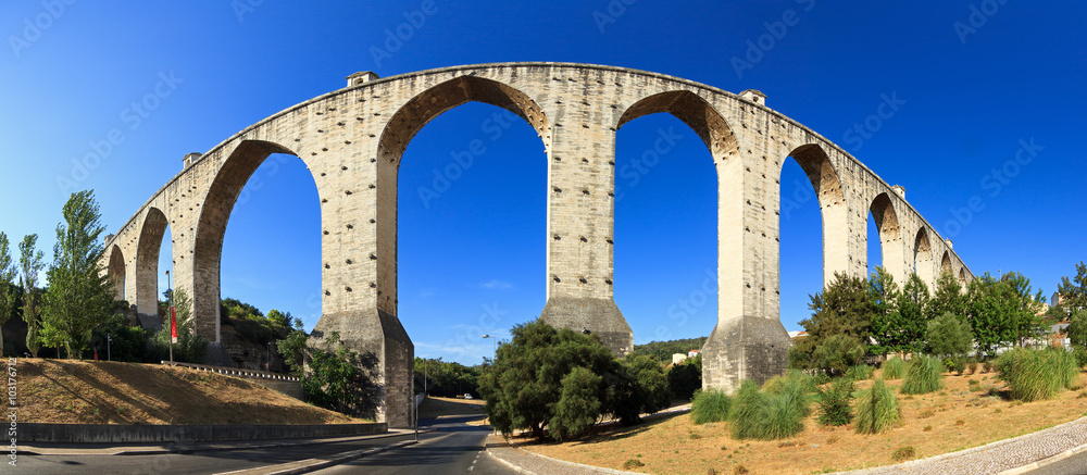 Beautiful wide angle panorama of the Aguas Livres Aqueduct in Lisbon, Portugal