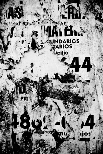 Random background collage paper texture on eroded wall
