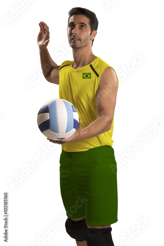 Professional Brazilian Volleyball player with ball.