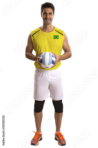 Professional Brazilian Volleyball player with ball. © paulovilela