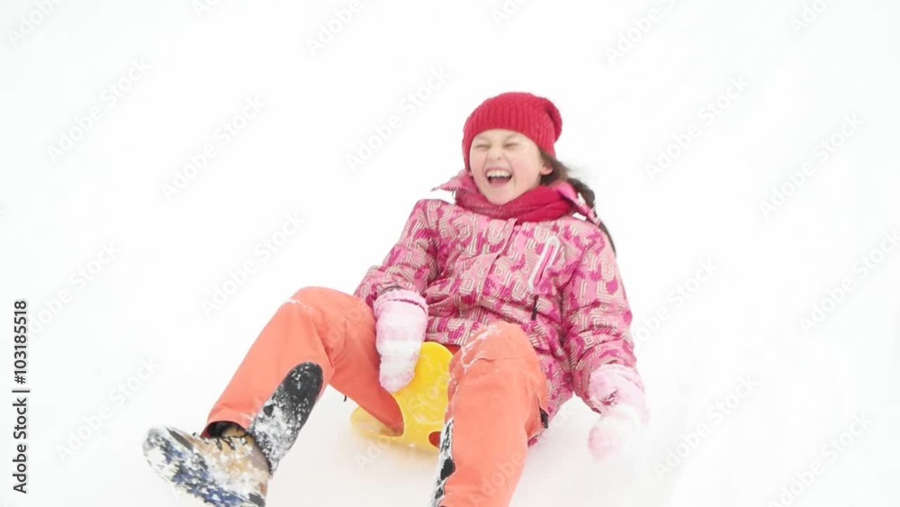girl sledding, slow motion girl sledding, slow motion