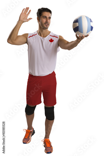 Professional Canadian Volleyball player with ball. photo