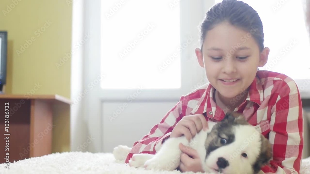 girl hugging a puppy Shepherd, slow motion girl hugging a puppy Shepherd, slow motion