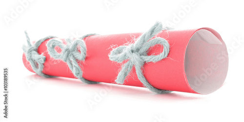 Red letter tube tied with string, three natural bows isolated