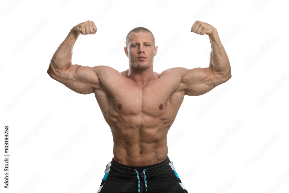 Bodybuilder And Double Biceps Pose Over White Background